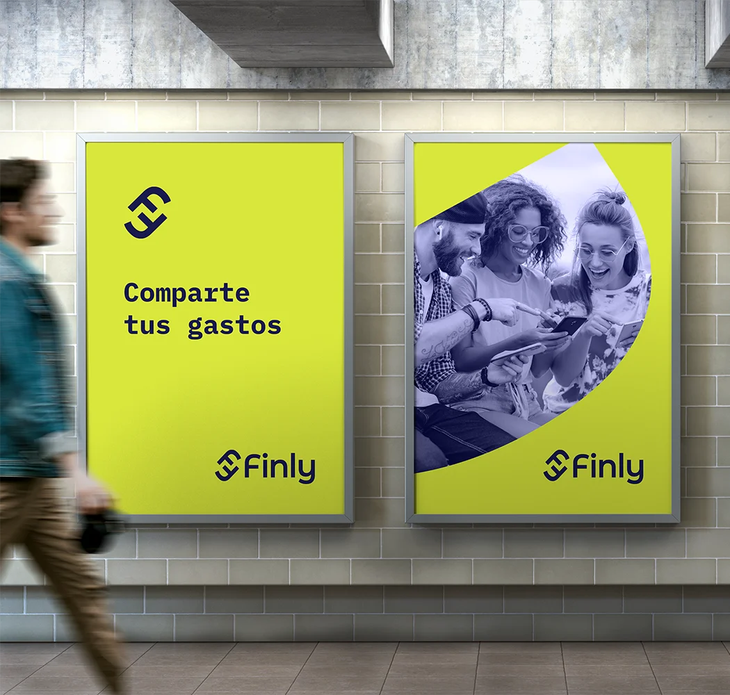 Two Finly campaign posters in a subway station